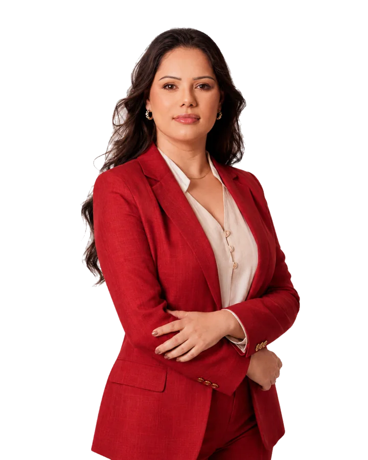 Franciele Sofiati wearing a red suit with her arms folded.